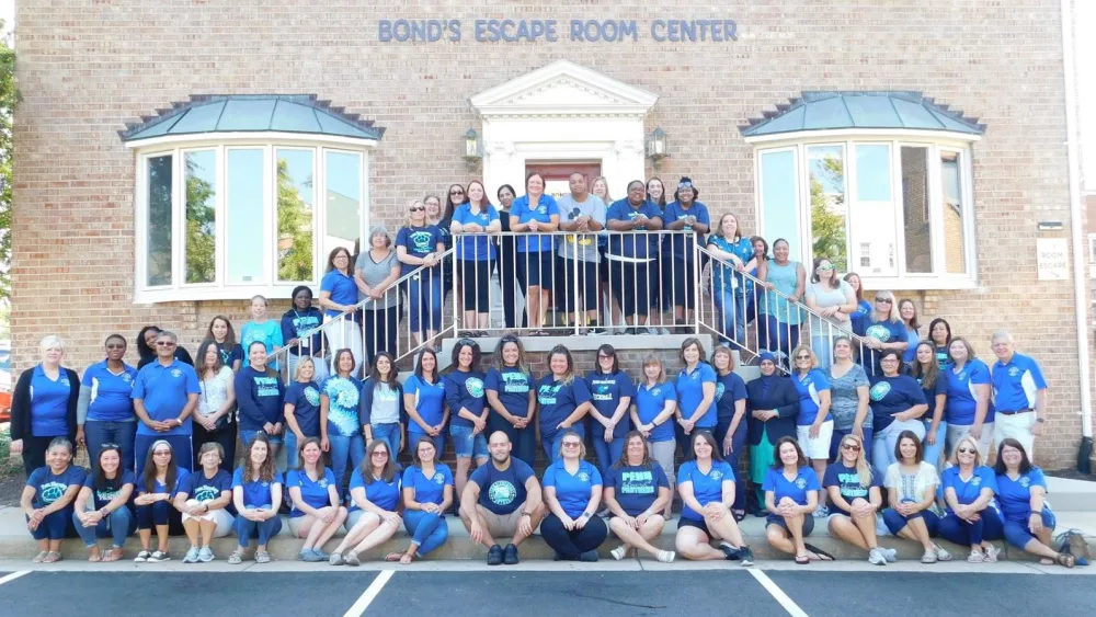 The Bond's team outside the escape room center in Old Town Fairfax
