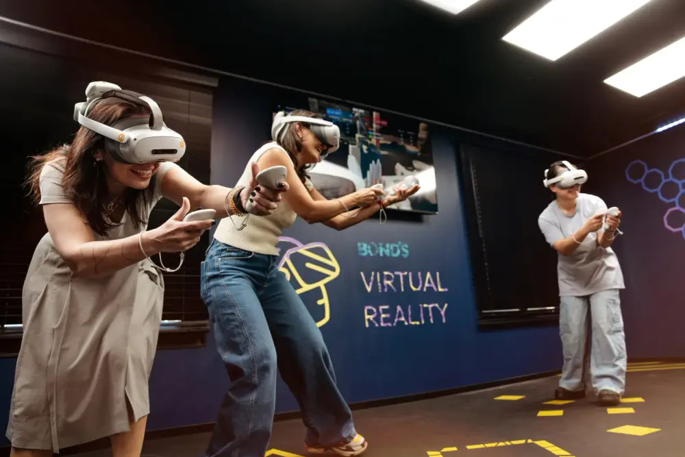 Players in free-roam VR headsets in the Fairfax arena