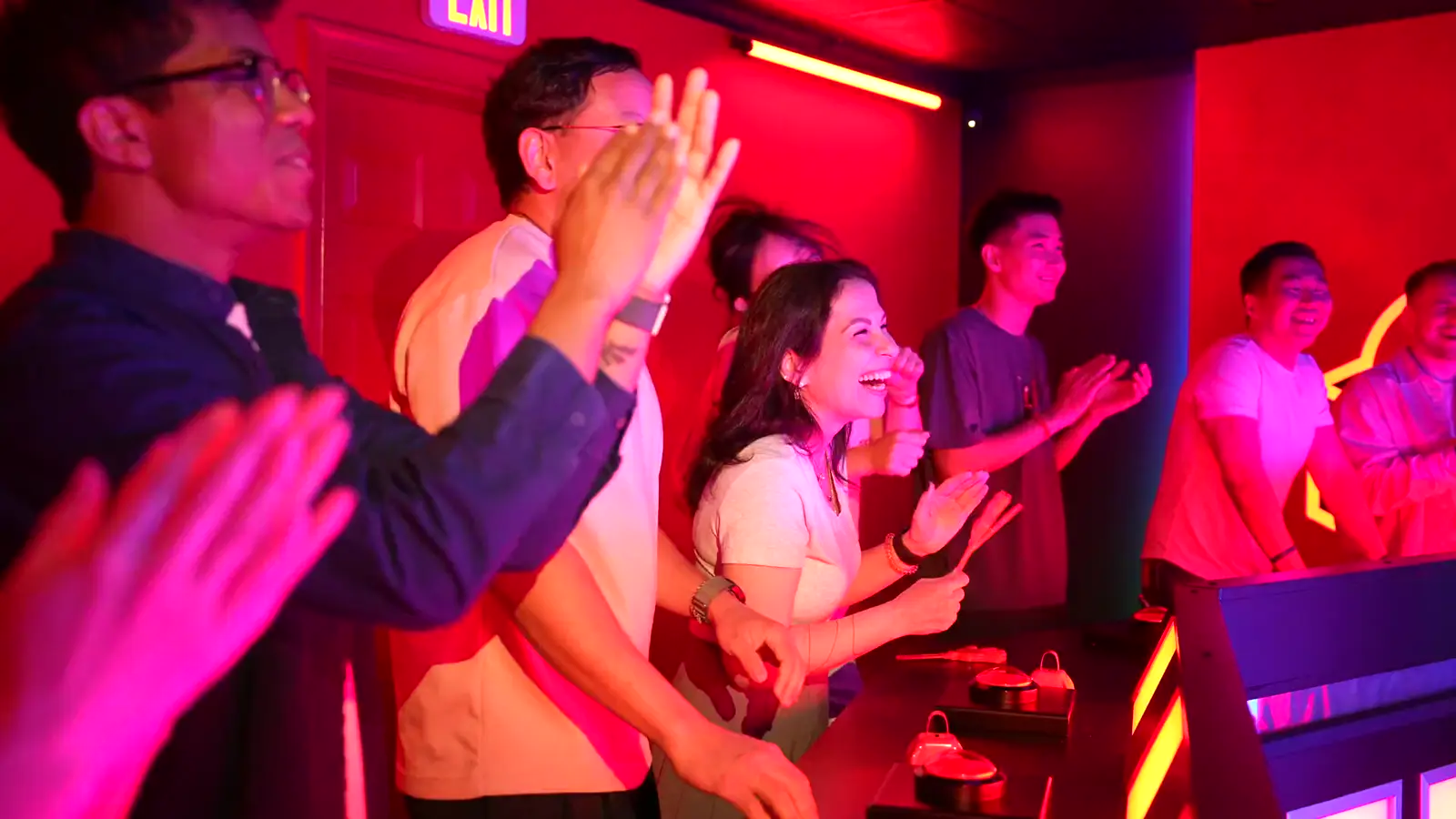 Players celebrating inside Bond's Entertainment Center
