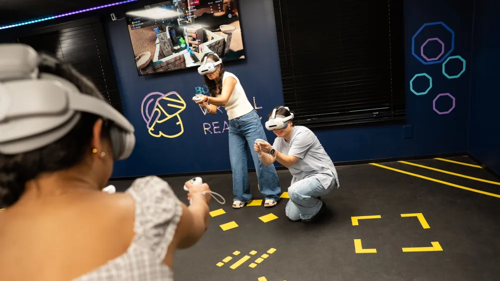 Players mid-game in the free-roam VR arena