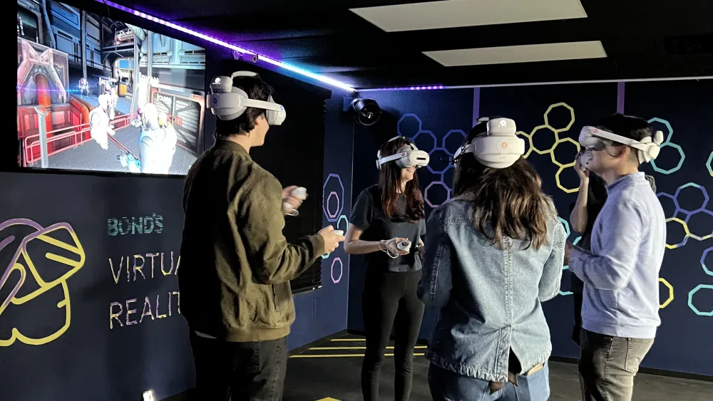 A squad playing a co-op mission together in the VR Arena