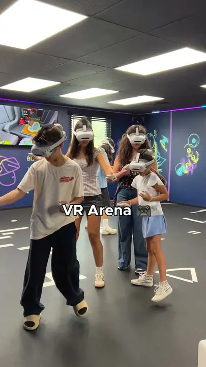 A group in VR headsets in the VR Arena, labelled "VR Arena"