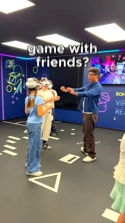A group in VR headsets in the arena, with the caption "game with friends?"